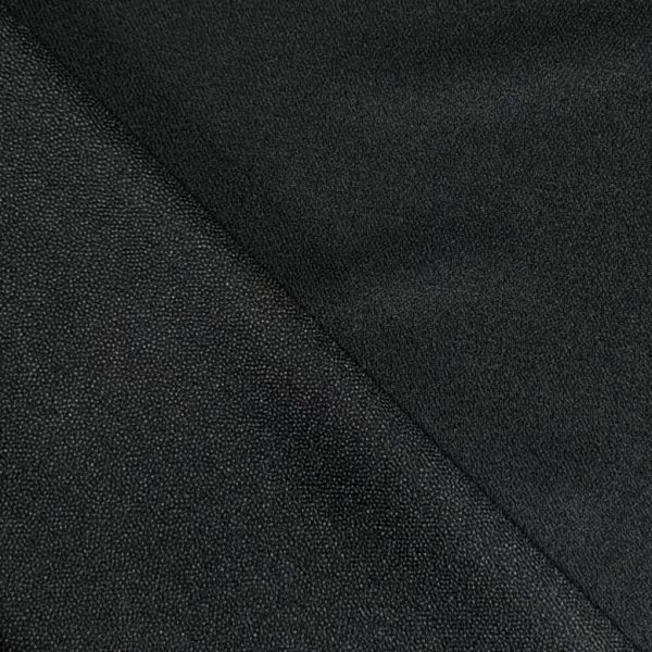 Pehmeä, hieman joustava, kreppisidoksinen silitettävä tukikangas - musta ja valkoinen