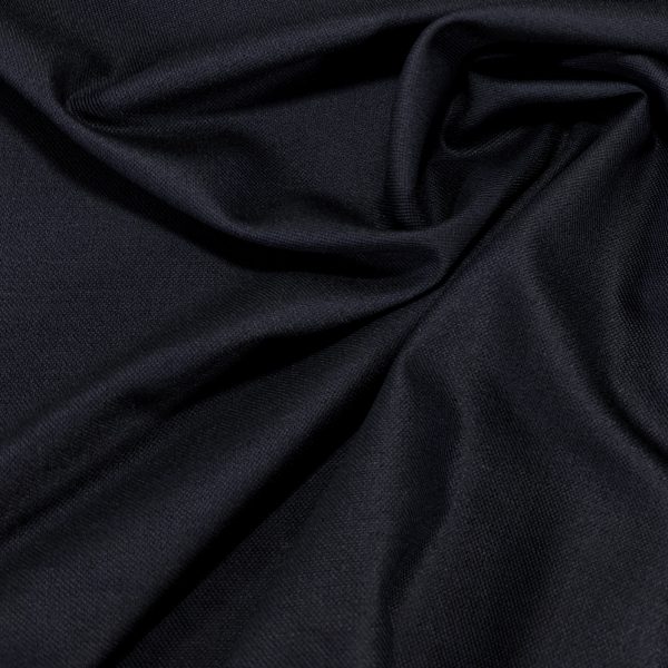 Sinimusta pukuvillakangas neitsytvillaa