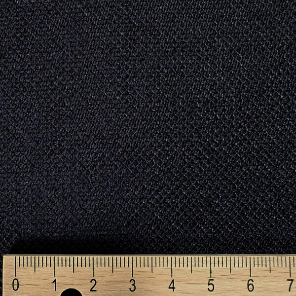 Sinimusta pukuvillakangas neitsytvillaa